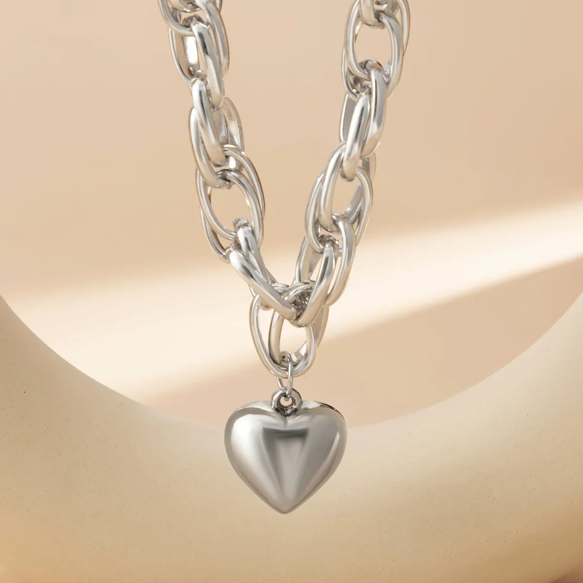 Ravena Bold Heart Pendant Necklace in Gold and Silver