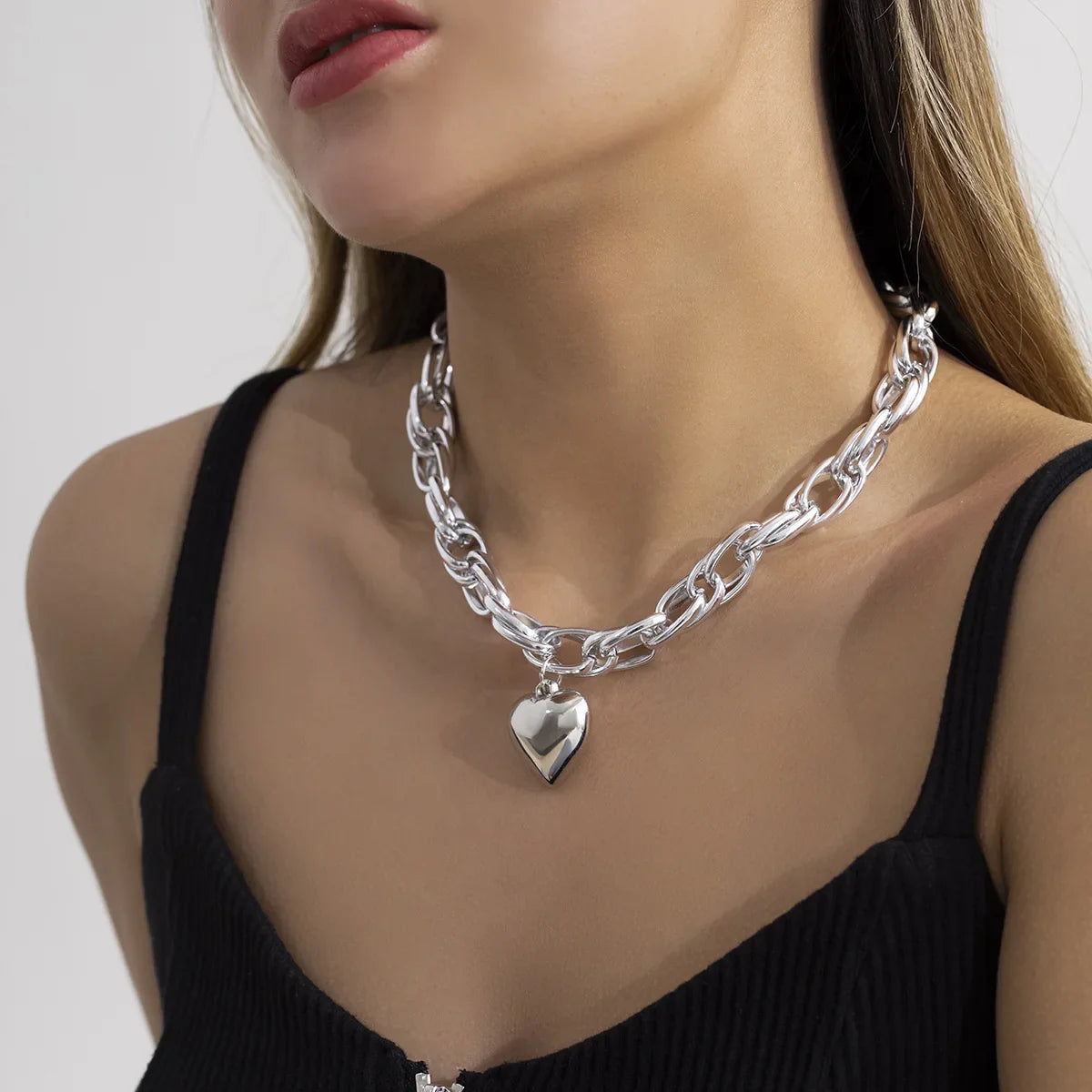 Ravena Bold Heart Pendant Necklace in Gold and Silver