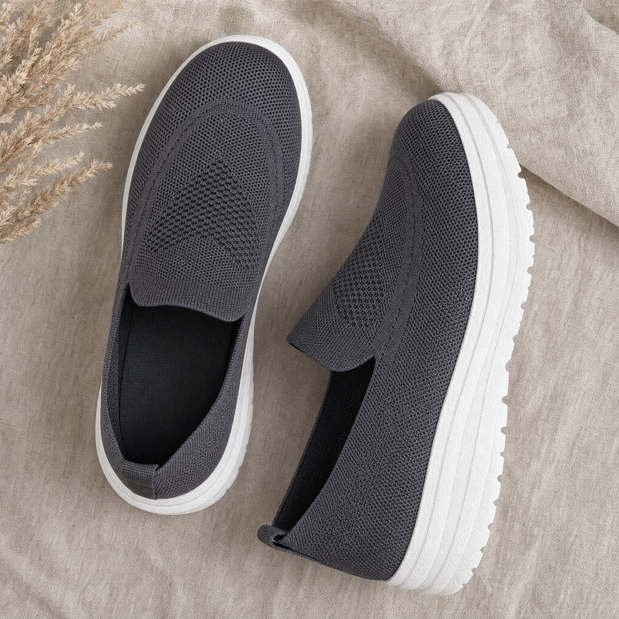 Grey knit slip-on sneakers with white platform sole, flatlay