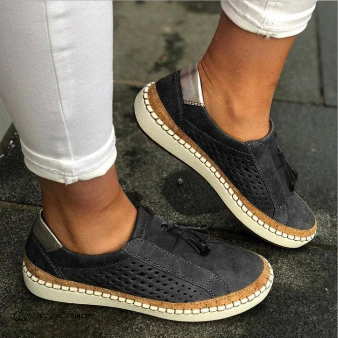 Women's Slip-On Perforated Sneakers With Tassel Detail