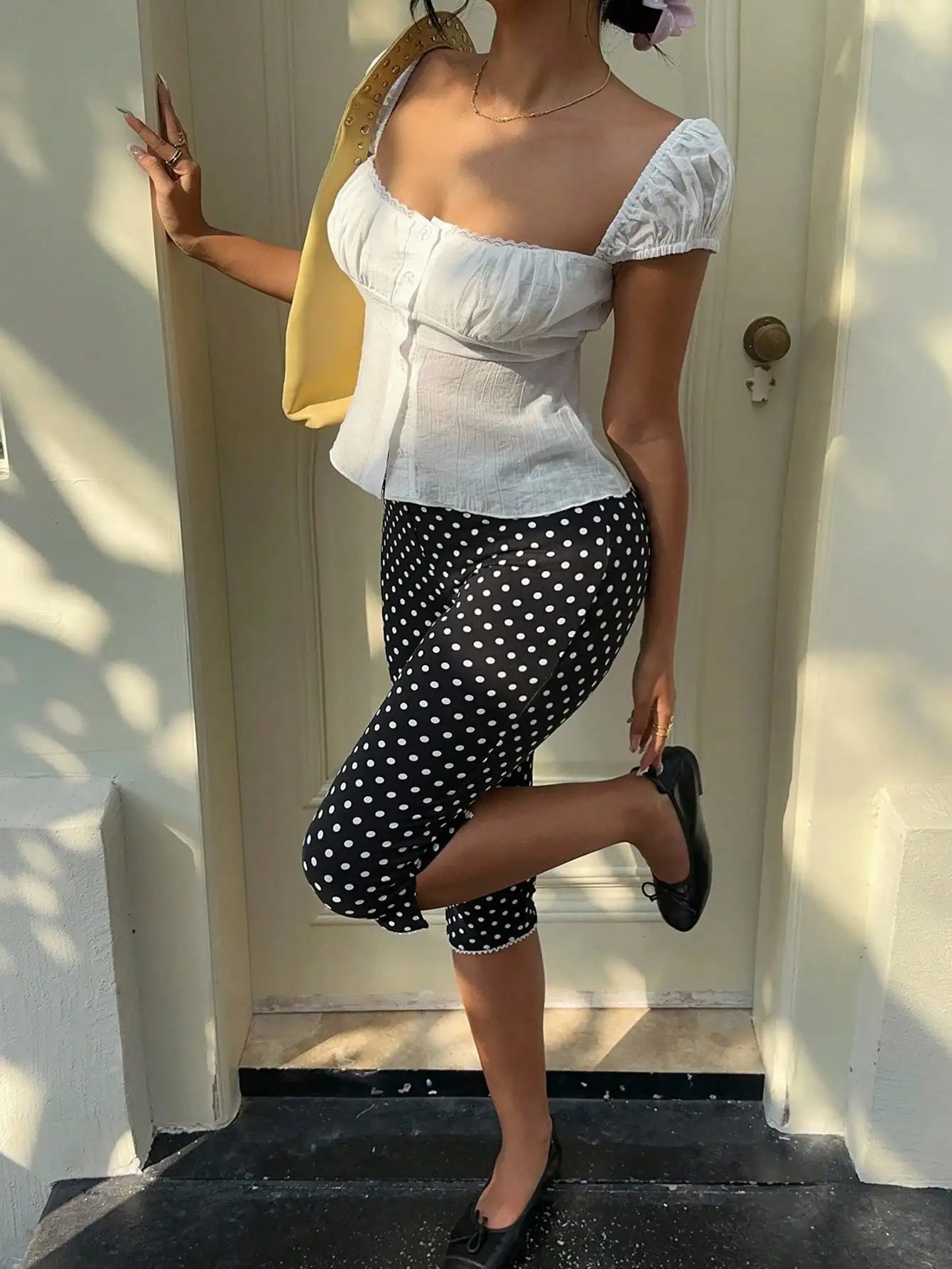 Polka Dot Stretch Capri Pants with Lace Ruffle Hem