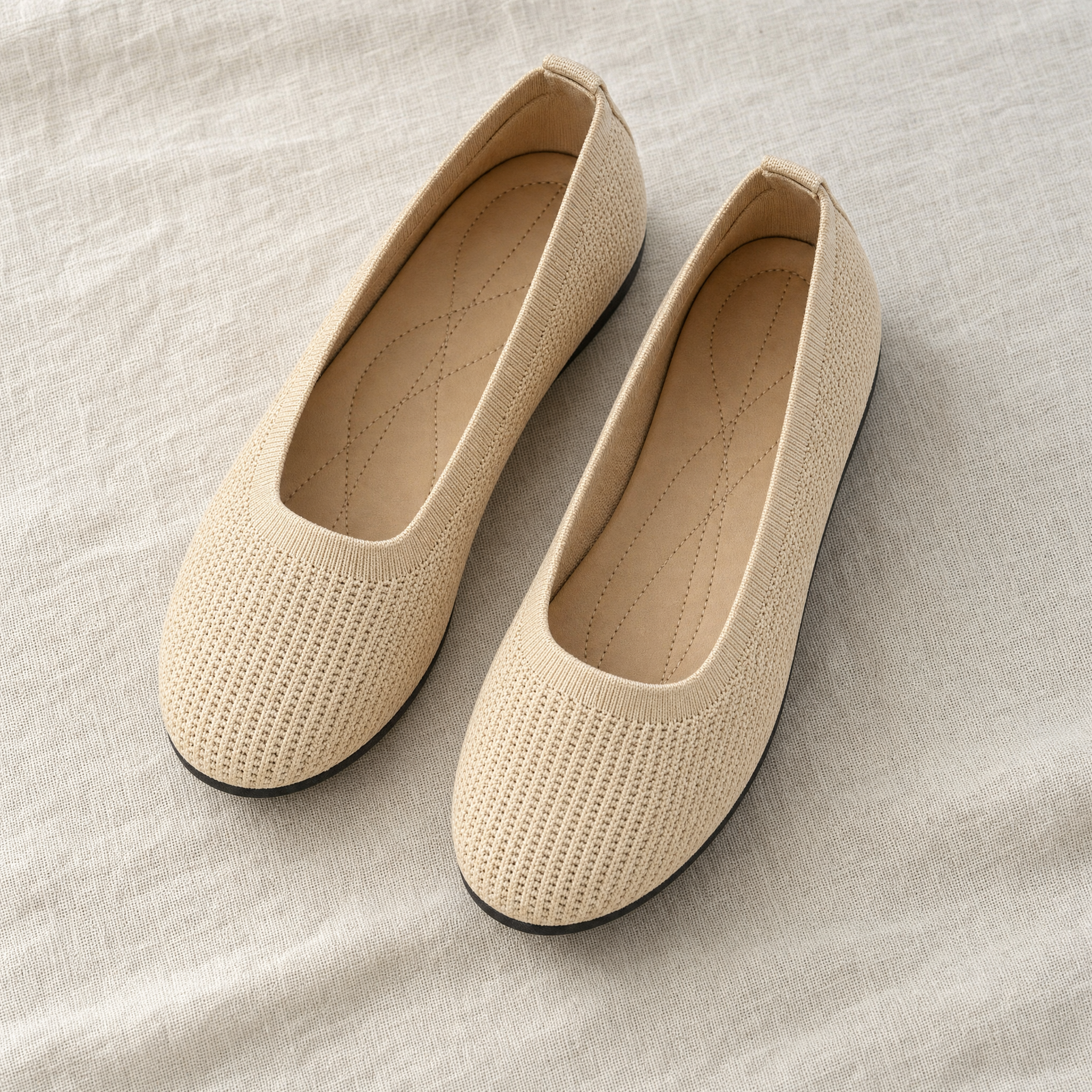 Beige knit slip-on flats, flatlay