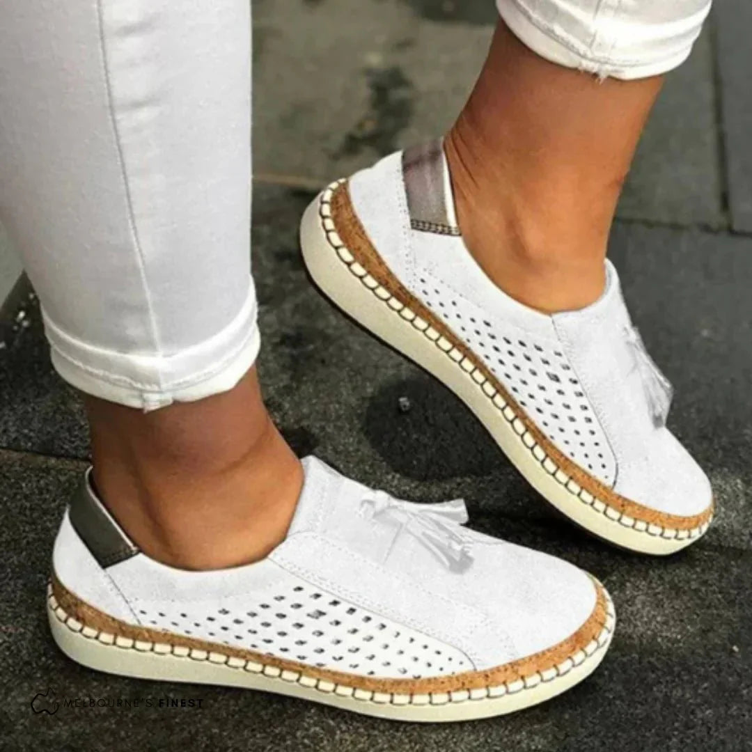 Women's Slip-On Perforated Sneakers With Tassel Detail